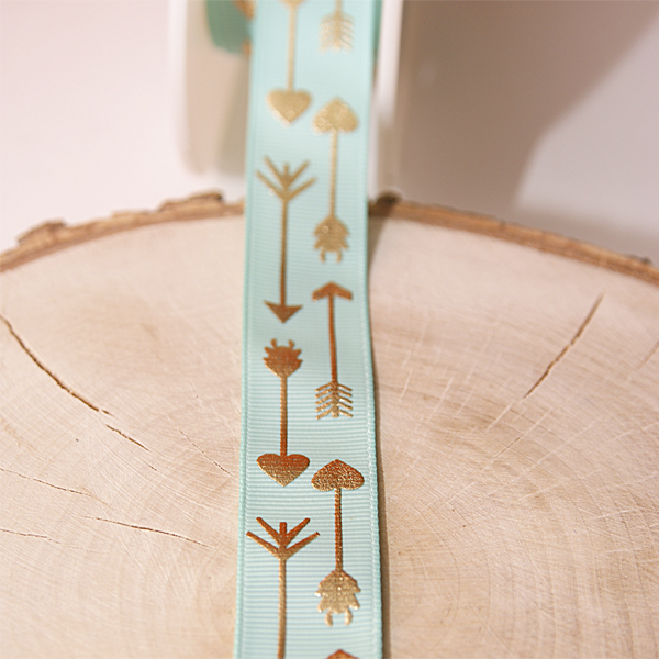 Лента репсовая 23 мм "Золотые стрелы на мятном",