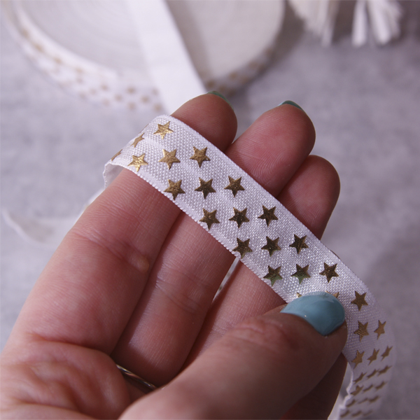 Резинка для блокнотов "Звёздочки", золотые на белом
