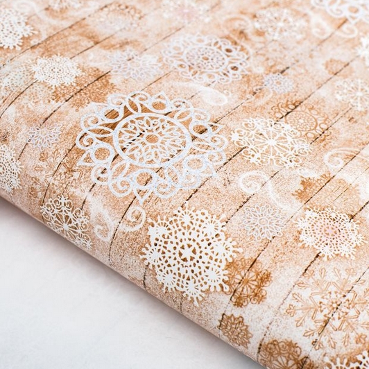 Бумага упаковочная глянцевая "Снежные следы"